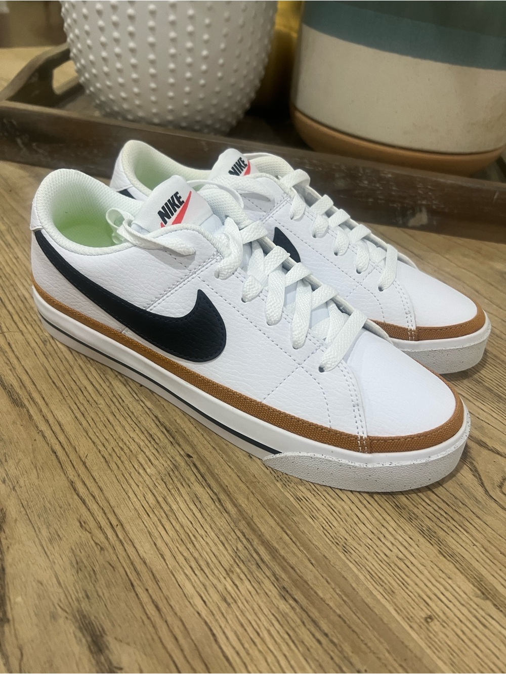 Nike Womens 8 White Sneakers with Black Swoosh and Brown Accent